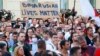 BELARUS -- People gather at a detention center during opposition rally in Minsk, Belarus, Monday, Aug. 17, 2020. 